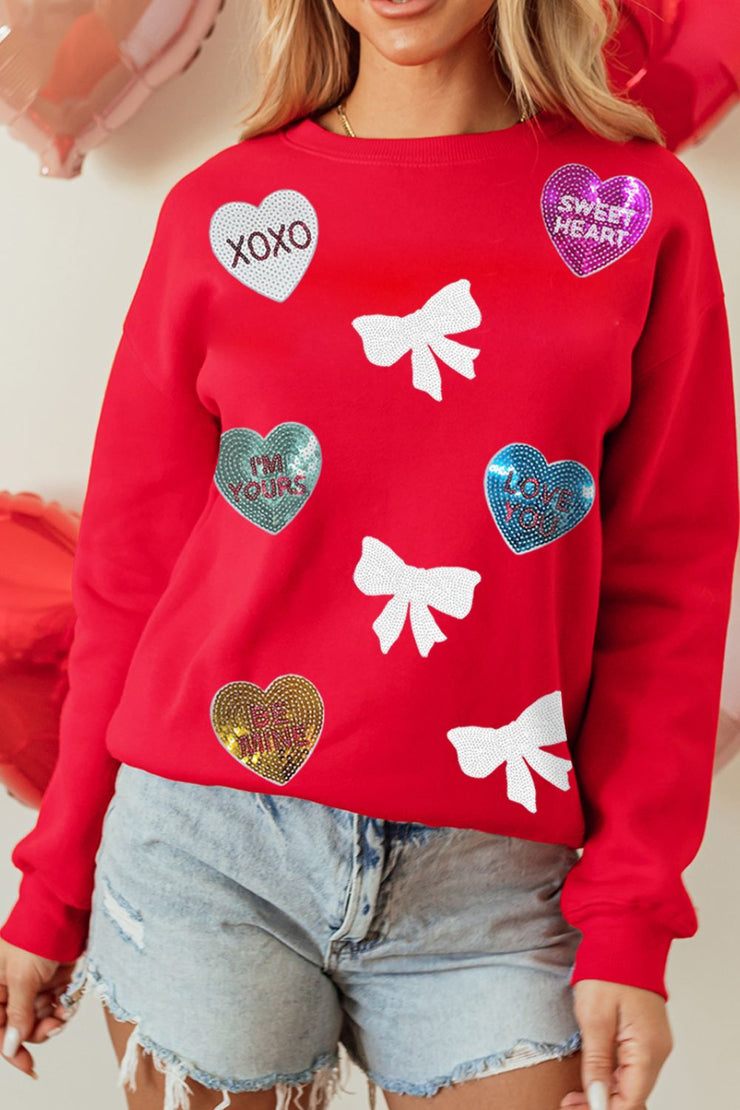 Sequin Bow Heart Sweatshirt with a Chic and Cozy Design