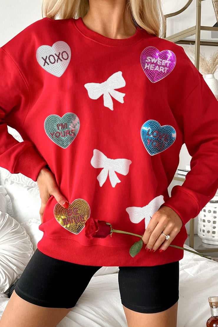 Sequin Bow Heart Sweatshirt with a Chic and Cozy Design